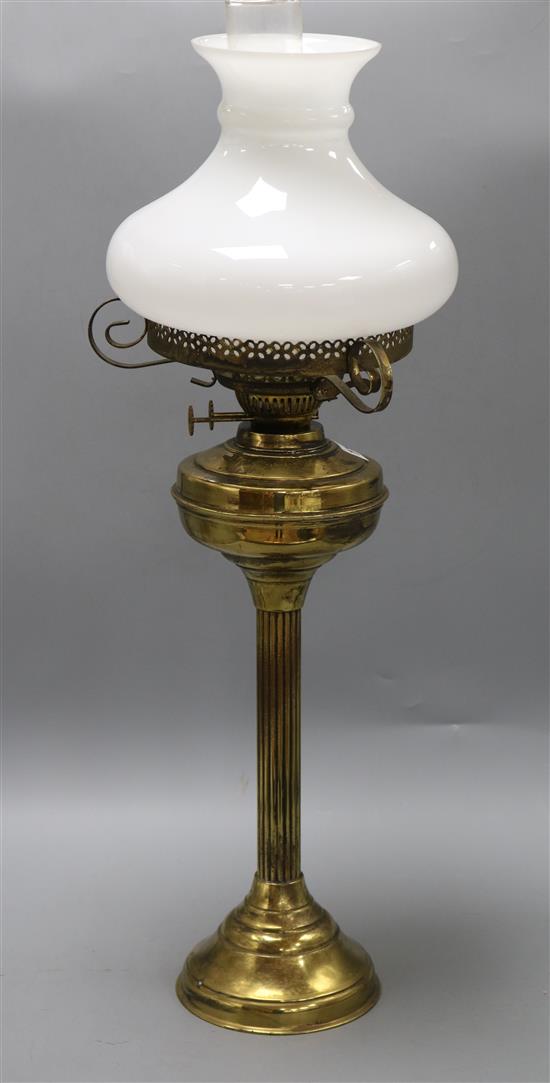 A Victorian brass reeded column oil lamp